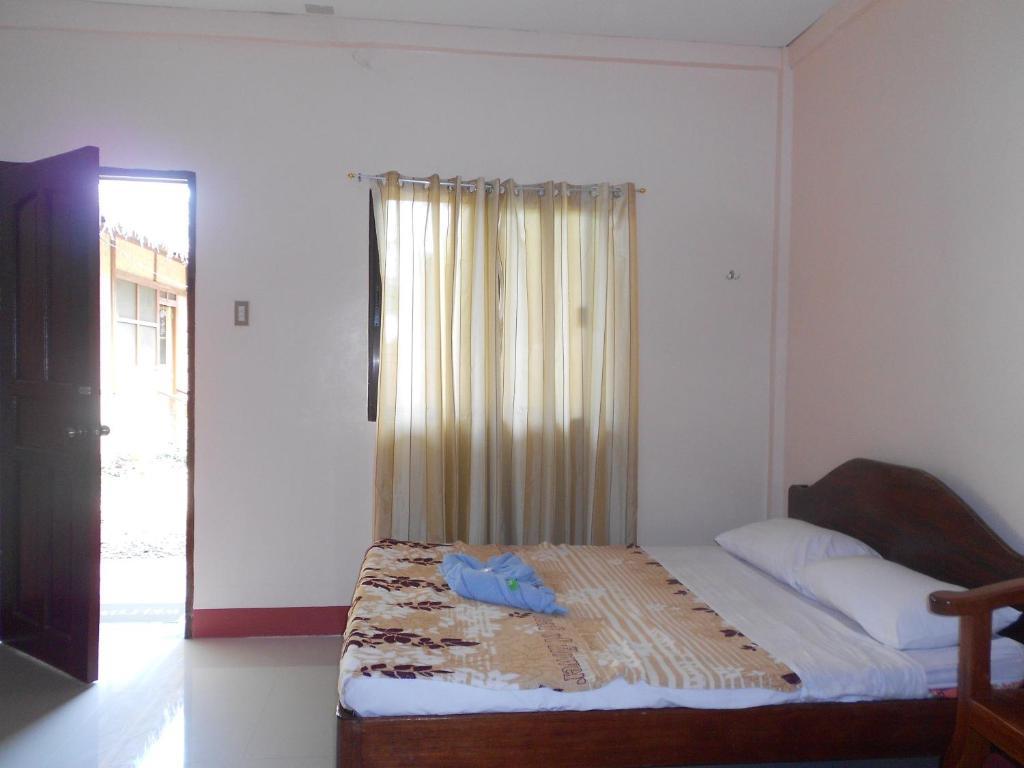 Tia Mers Guest House Puerto Princesa Ruang foto